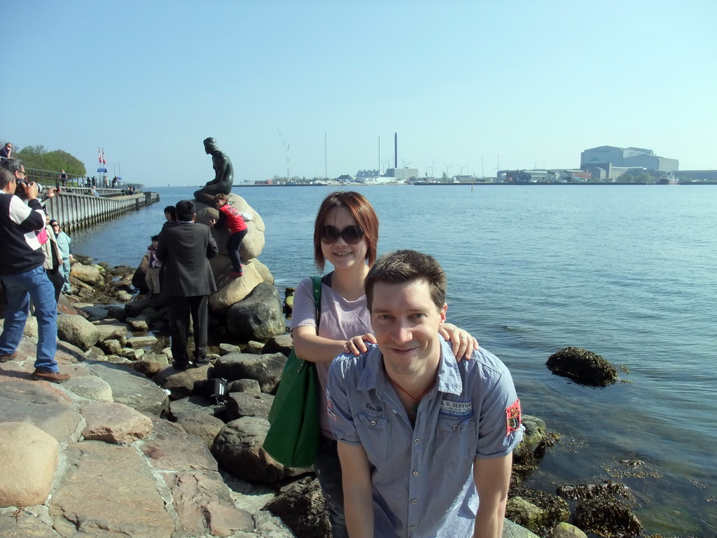 Tim and Miaomiao with the statue `The Little Mermaid` at the Langelinie pier