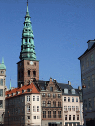 The tower of the Saint Nicholas Church and houses at the Amagertorv square