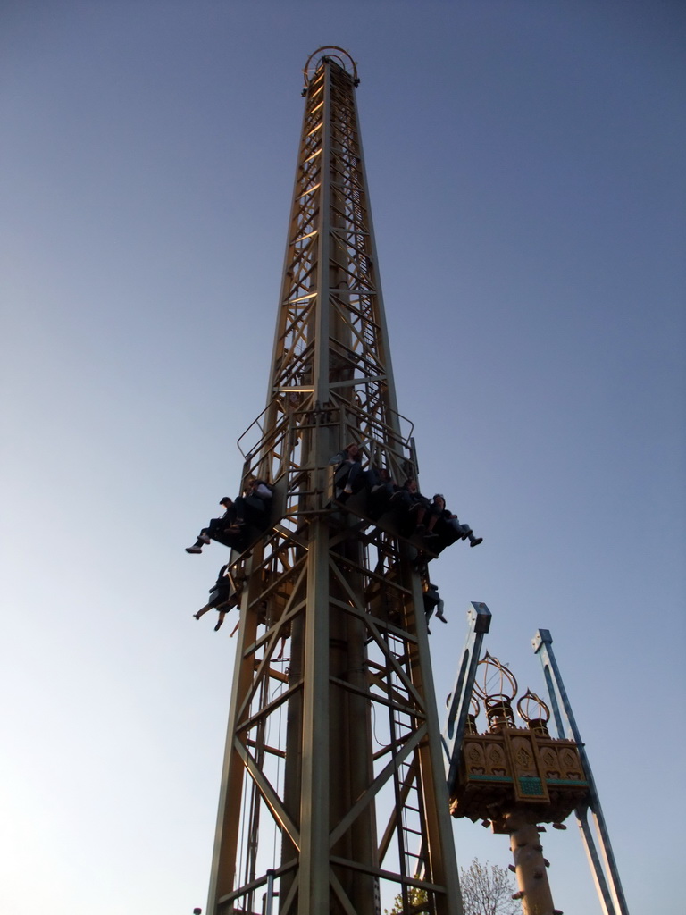 The attractions `The Golden Tower` and `Vertigo` at the Tivoli Gardens