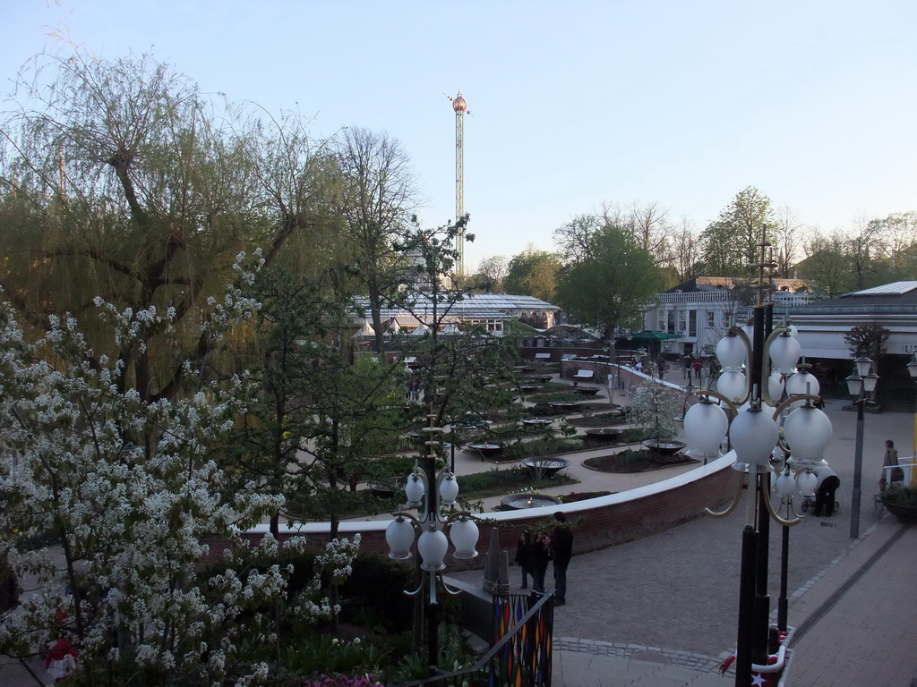 Plants, the Glass Hall Theatre and the attraction `The Star Flyer` at the Tivoli Gardens