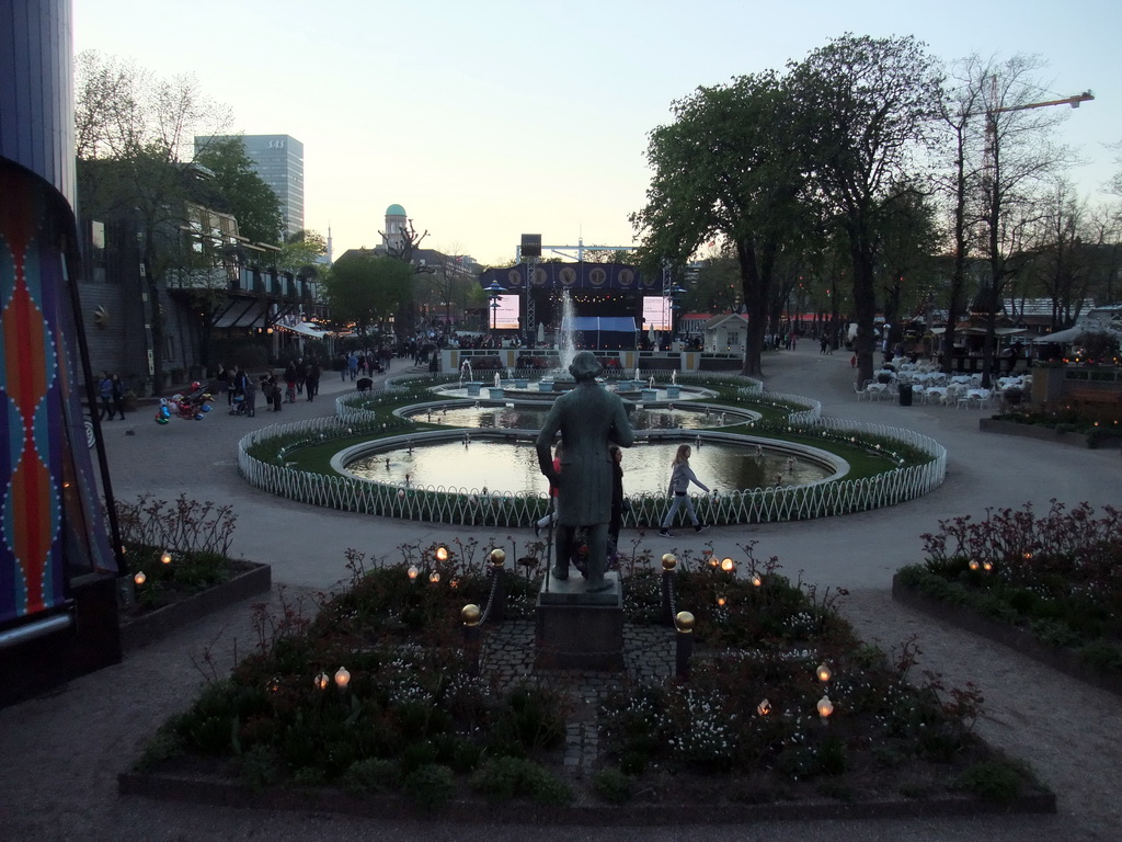 Statue of Hans Christian Andersen, fountains and the Open Air Stage at the Tivoli Gardens