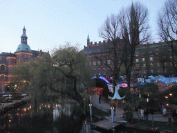 The Dragon Boat Lake, the H.C. Andersen Castle and the Copenhagen City Hall, viewed from the `Pirateriet` restaurant at the Tivoli Gardens