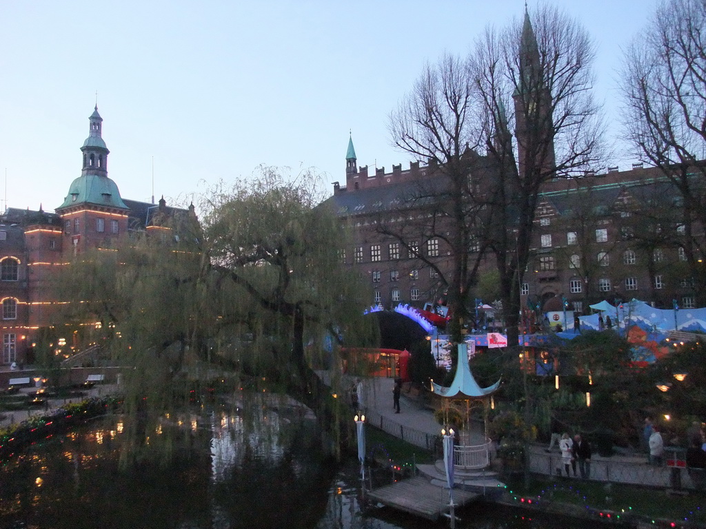 The Dragon Boat Lake, the H.C. Andersen Castle and the Copenhagen City Hall, viewed from the `Pirateriet` restaurant at the Tivoli Gardens
