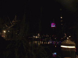 The `Pirateriet` restaurant at the Dragon Boat Lake and the attractions `Vertigo` and `The Golden Tower` at the Tivoli Gardens, by night