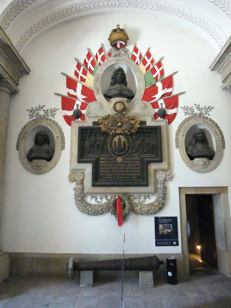 Busts, relief and cannon at the entrance of the Castle Ruins under Christiansborg Palace