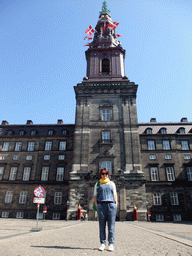 Miaomiao with the Christiansborg Palace Tower at the inner square of Christiansborg Palace