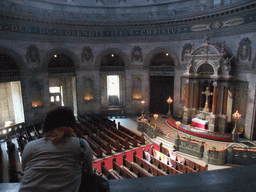 Miaomiao at the upper floor of Frederik`s Church, with a view on the nave and altar