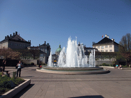 Fountain at the Amaliehaven garden of the Amalienborg Palace, and the dome of the Frederik`s Church