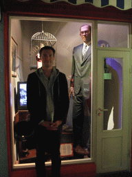 Tim with a wax statue of the Robert Wadlow, the world`s tallest man