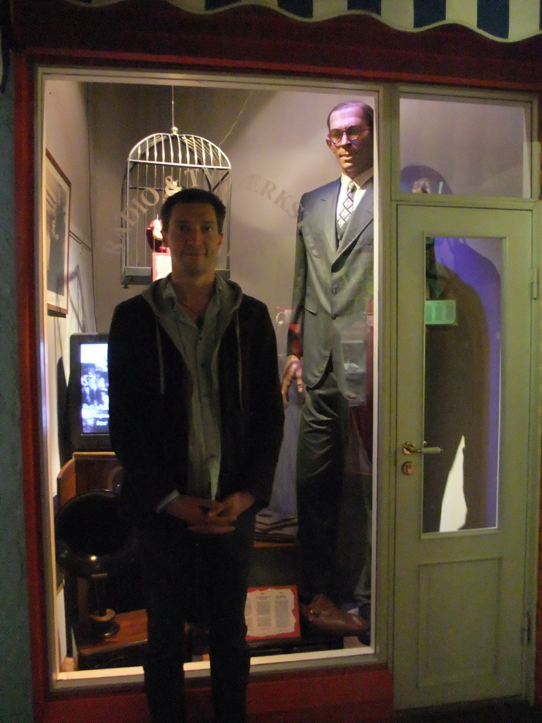 Tim with a wax statue of the Robert Wadlow, the world`s tallest man