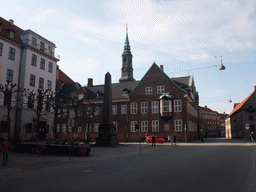 Bispetorvet square with the Reformation monument and the Tower of St. Peter`s Church (St. Petri Kirke)