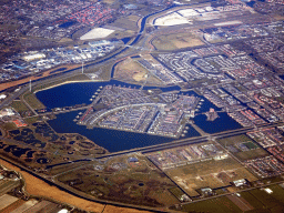 The Stad van de Zon neighbourhood, Park van Luna park and Meer van Luna lake in the city of Heerhugowaard, viewed from the airplane from Amsterdam