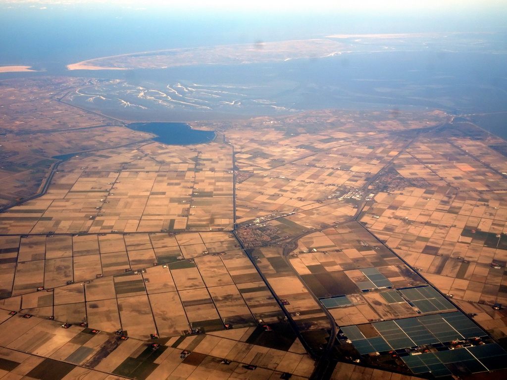 The north tip of the province of North-Holland, the island of Texel and the Wadden Sea, viewed from the airplane from Amsterdam