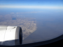 The north tip of the province of North-Holland, the islands of Texel and Vlieland, the west side of the Afsluitdijk causeway, the Wadden Sea and the IJsselmeer lake, viewed from the airplane from Amsterdam