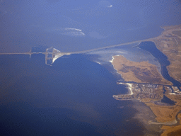 The east side of the Afsluitdijk causeway, the town of Makkum, the Wadden Sea and the IJsselmeer lake, viewed from the airplane from Amsterdam