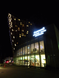 The AC Hotel Bella Sky Copenhagen and the front of the Bella Center at the Center Boulevard, by night