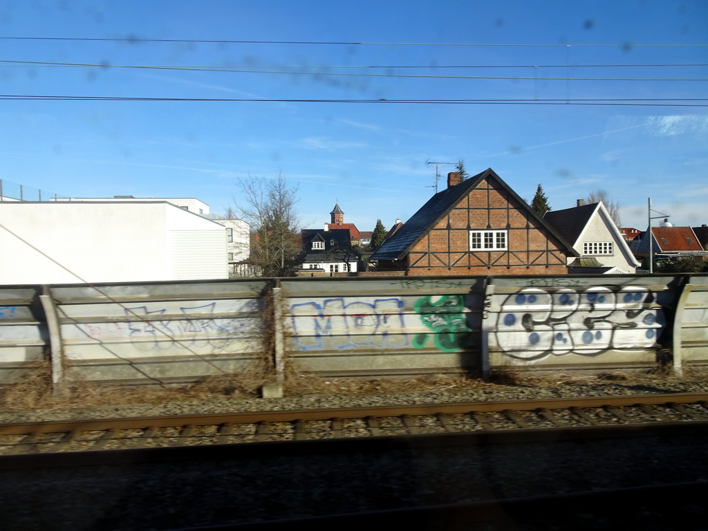 The town of Glostrup with the Det Gamle Vandtårn tower, viewed from the train to Roskilde
