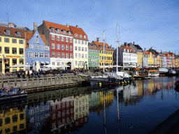 Boats, houses and restaurants at the northwest side of the Nyhavn harbour