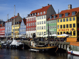 Boats, houses and restaurants at the northwest side of the Nyhavn harbour