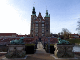 Lion statues and the entrance bridge over the canal to the southeast side of the Rosenborg Castle