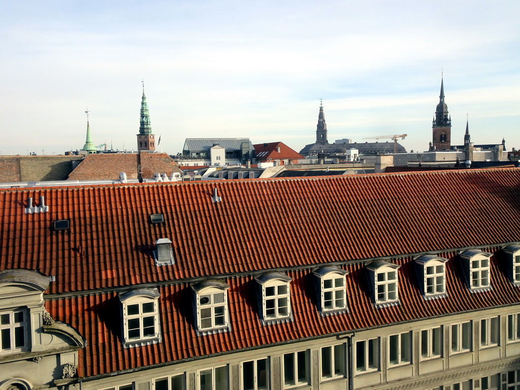 The towers of the St. Nicholas Church, the Christiansborg Palace and the Church of the Holy Ghost, viewed from the Library Hall of the Rundetaarn tower