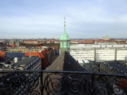 The northeast side of the city with the roof and tower of the Trinitatis Church, the Rosenborg Castle and the dome of Frederik`s Church, viewed from the viewing platform at the top of the Rundetaarn tower