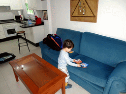 Max in the living room of our apartment at the Beachfront Apartments in Costa Adeje