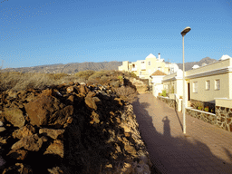 Northeast side of the street behind the Beachfront Apartments in Costa Adeje, and the La Cueva hill