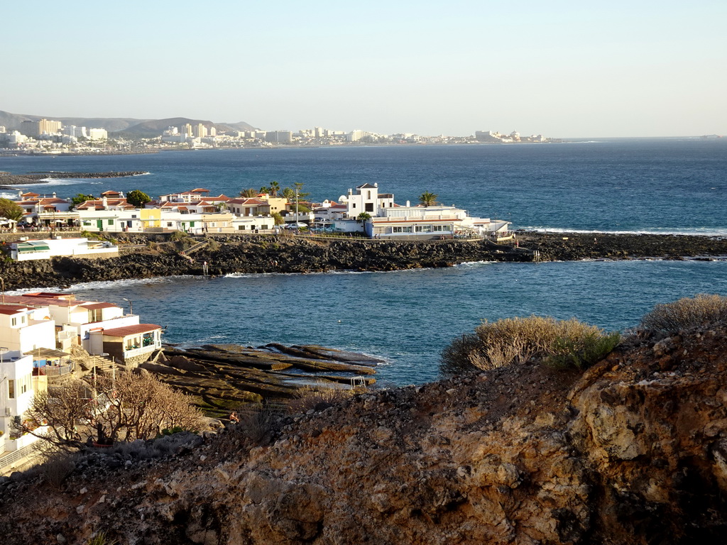 The Playa La Caleta beach and restaurants at the Calle los Pescadores street, viewed from the La Cueva hill
