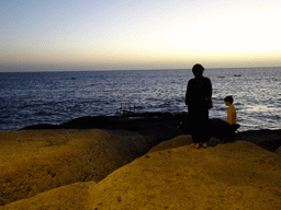 Miaomiao and Max at the Playa La Caleta beach, at sunset