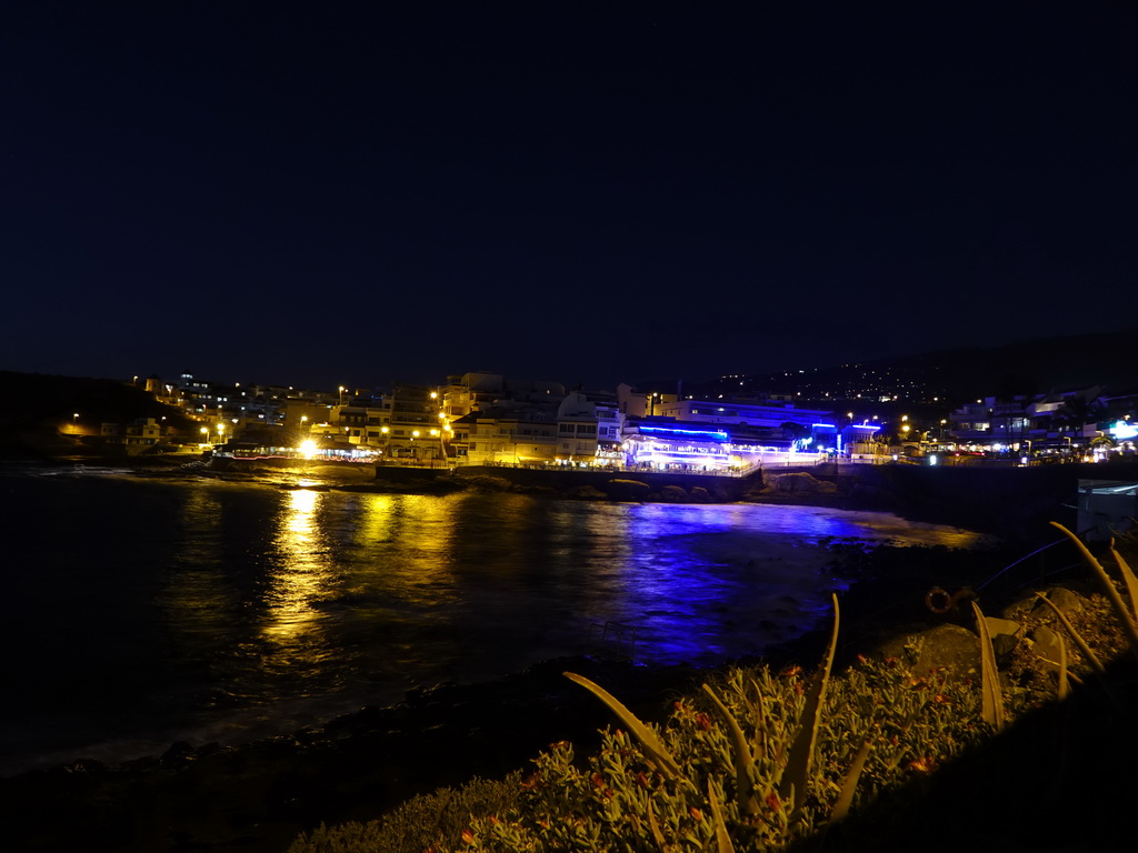 The restaurants on the north side of the Calle los Pescadores street, by night