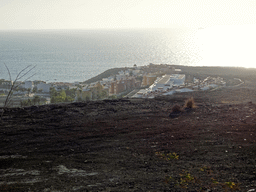 The La Caleta neighbourhood and the La Cueva hill, viewed from the Avenida de los Acantilados street