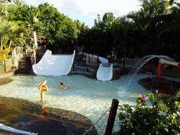Small swimming pool at the right side of the Lost City attraction at the Siam Park water theme park