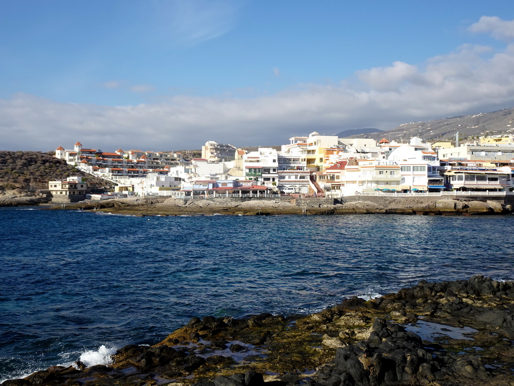 The Playa El Cobero beach and restaurants at the Calle los Pescadores street