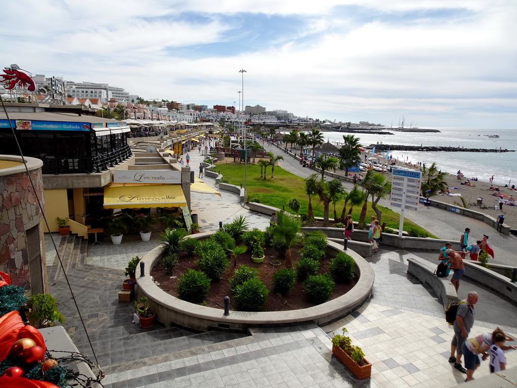 The Centro Comercial Litoral, the Avenida Litoral Playa Fañabé street and the Playa De Fañabé beach, viewed from the Restaurante La Farola del Mar