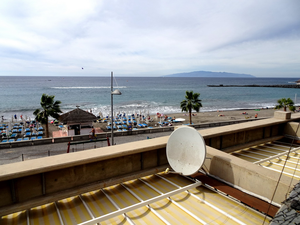 The Playa De Fañabé beach and the island of La Gomera, viewed from the Restaurante La Farola del Mar