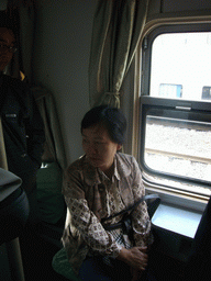 Miaomiao`s mother in the sleeper train from Kunming to Dali