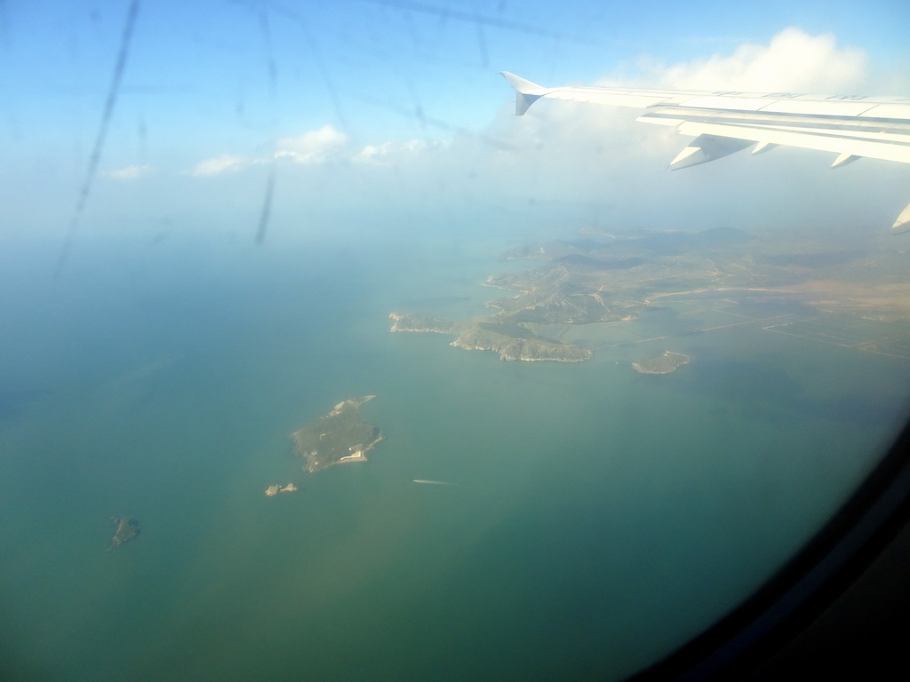 The Ertuozi and Hantuozi islands and the coastline on the west side of the city, viewed from the airplane from Beijing