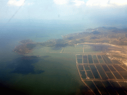 The Hantuozi island and the coastline on the west side of the city, viewed from the airplane from Beijing