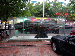 Tree trunk with inscriptions at Fushun Street