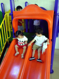 Max and his cousin playing at the Yon Ho restaurant