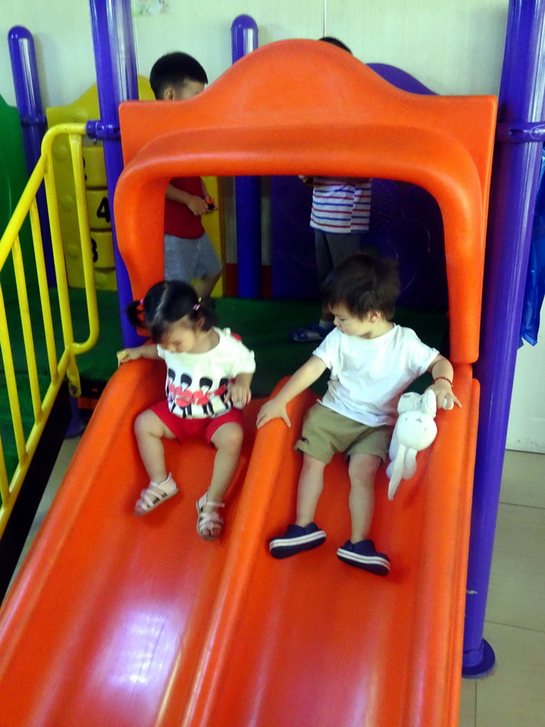 Max and his cousin playing at the Yon Ho restaurant