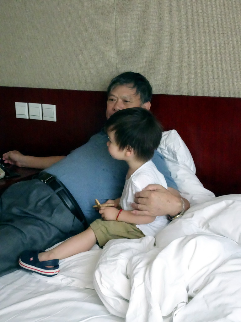 Max with his grandfather at his grandparents` room at the New Sea View International Hotel