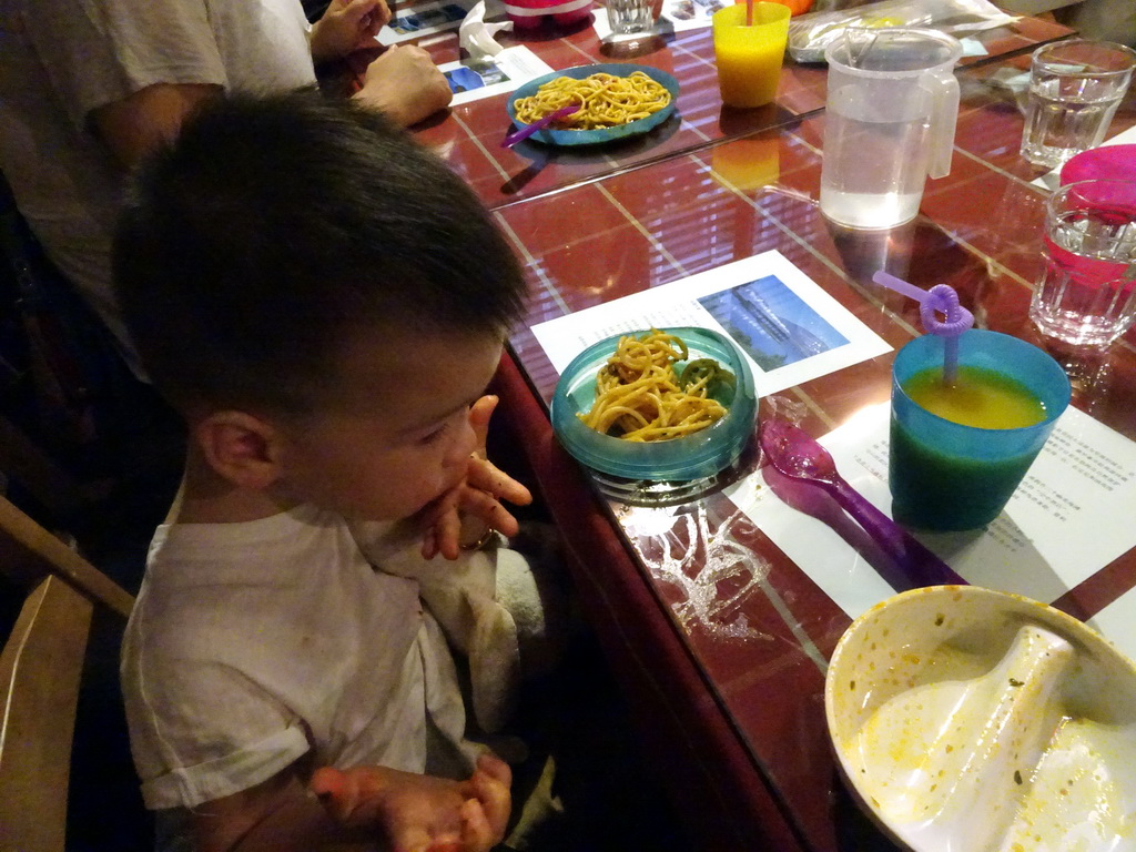 Max having dinner at the Tribes restaurant in a shopping mall at Fushun Street