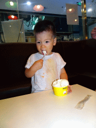 Max having ice cream at the Tribes restaurant in a shopping mall at Fushun Street