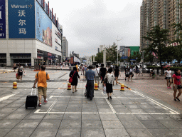 Miaomiao`s family at Jinma Road with the Dalian Development Area Grand Theatre