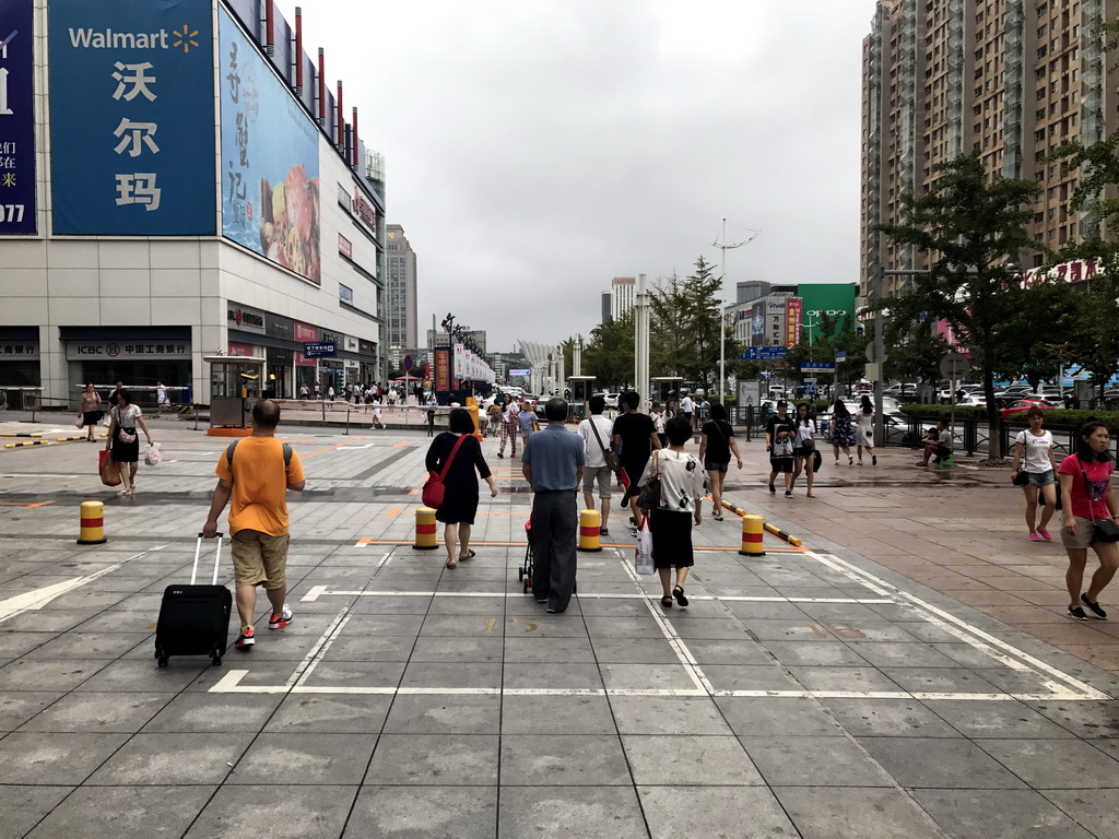 Miaomiao`s family at Jinma Road with the Dalian Development Area Grand Theatre