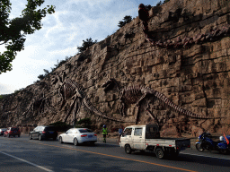 Rock with dinosaur skeletons at Binhai Road