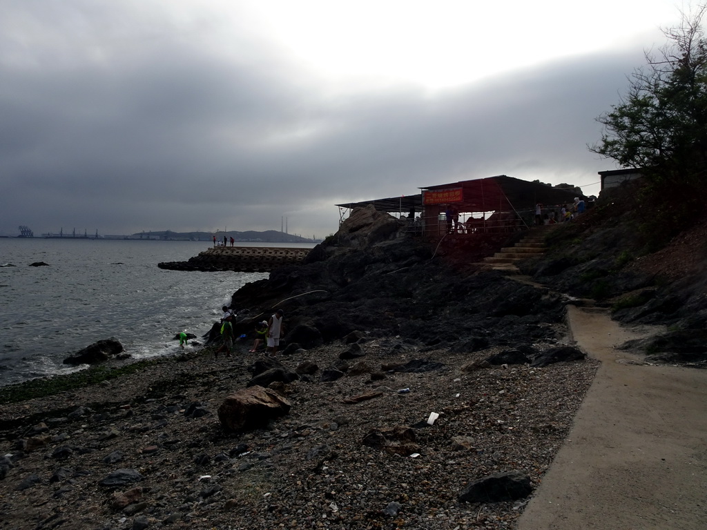 Rock beach just below a square at Binhai Road