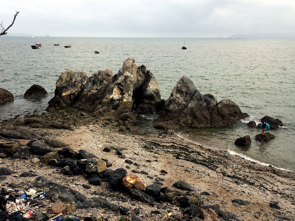 Rock beach just below a square at Binhai Road